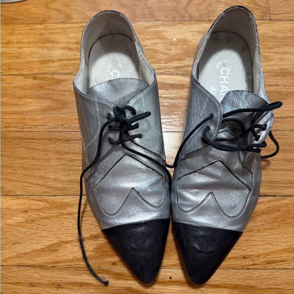 CHANEL Metallic Silver Leather Pointed Oxfords with Black Toe Caps